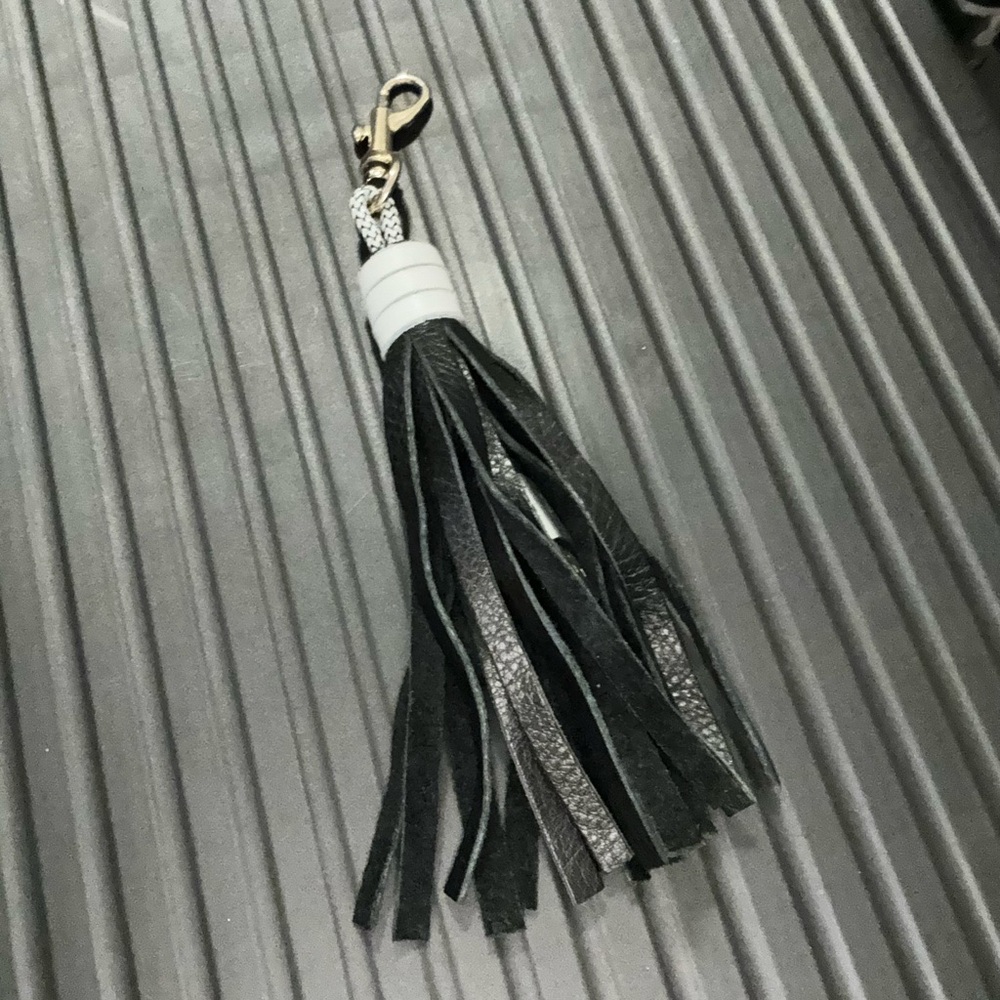 Urban outfitters tassle clip on keychain with iphone/usb charger